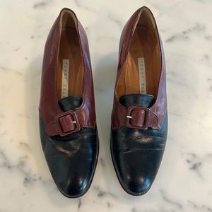 Perth Ellis loafer style flats. 1 1/2 inch heel. Burgundy and black leather.